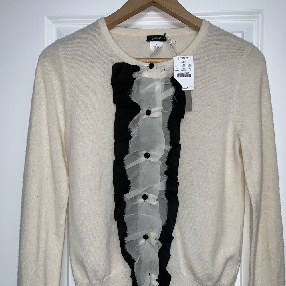A delicate new with tags ivory J. Crew cardigan